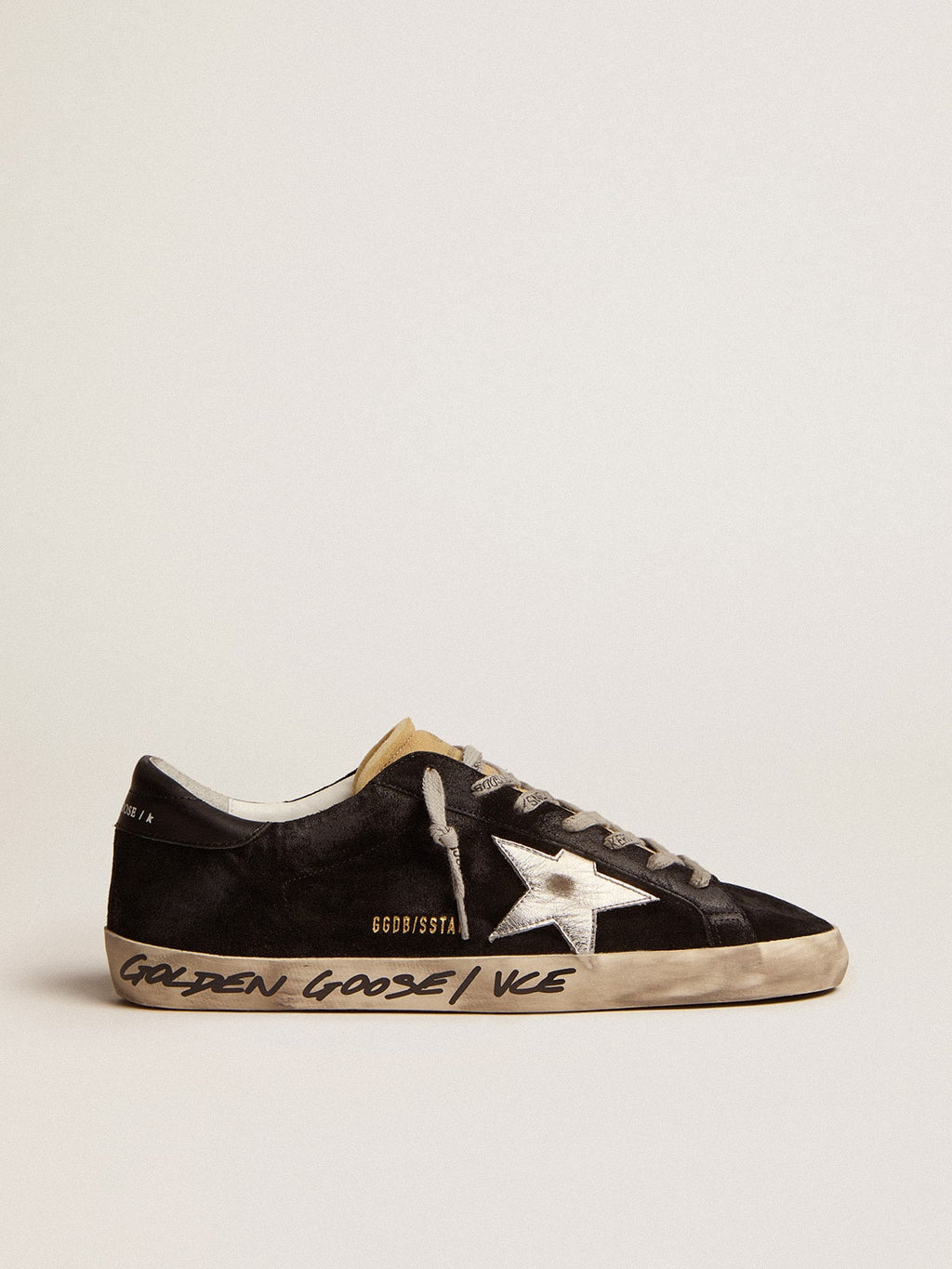 Super-Star de hombre en ante negro con estrella de piel laminada plata