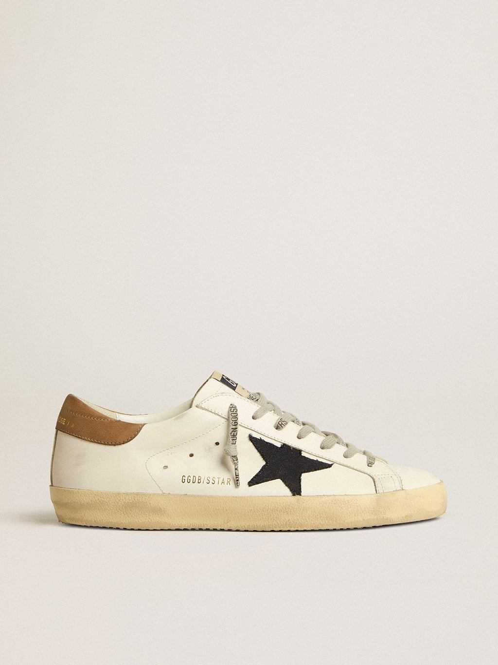 Super-Star con estrella de lona azul y lengüeta de talón de cuero color tabaco