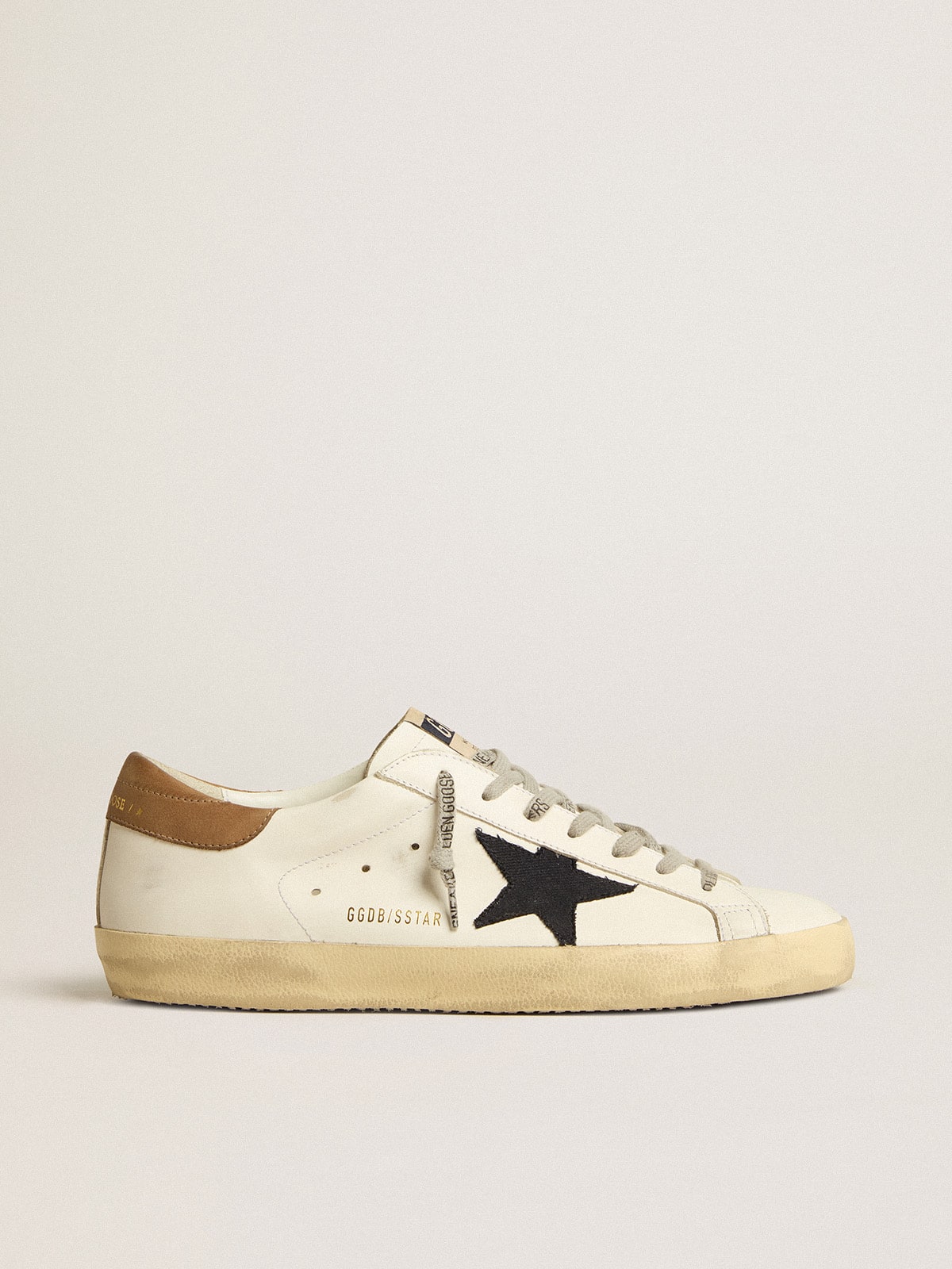 Super-Star con estrella de lona azul y lengüeta de talón de cuero color tabaco