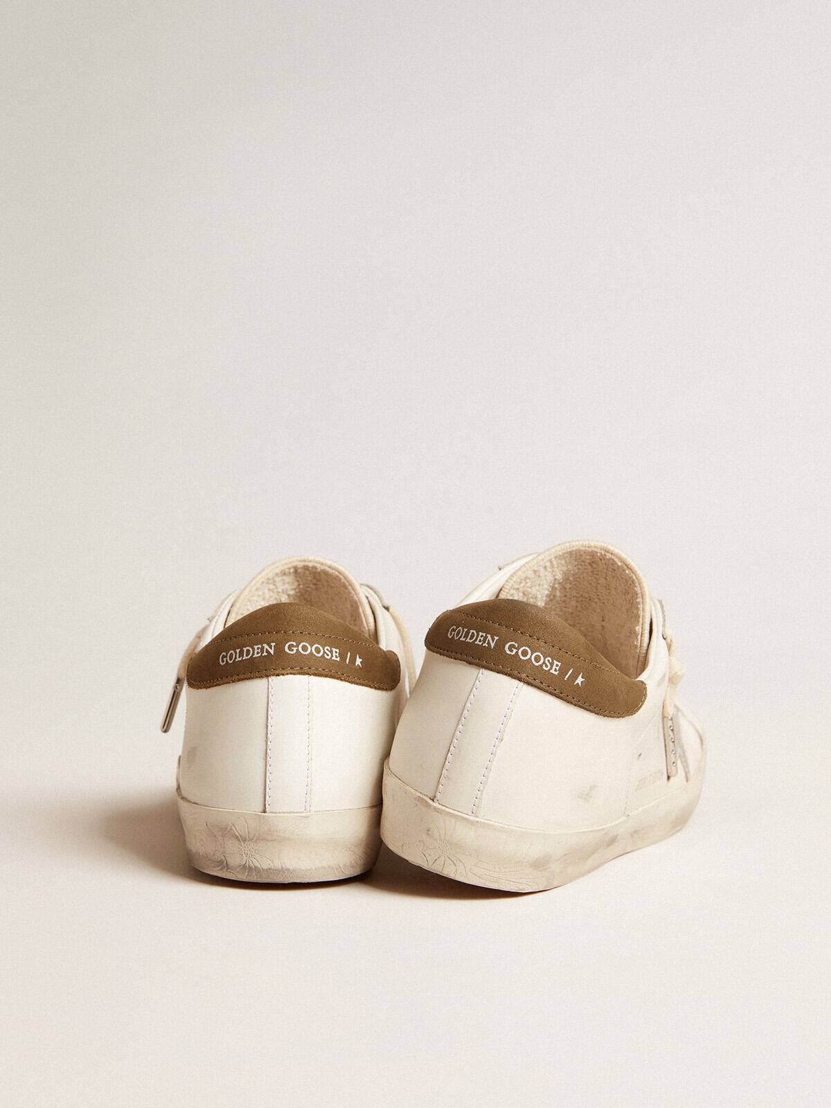 Super-Star LTD con stella in pelle laminata argento e talloncino marrone