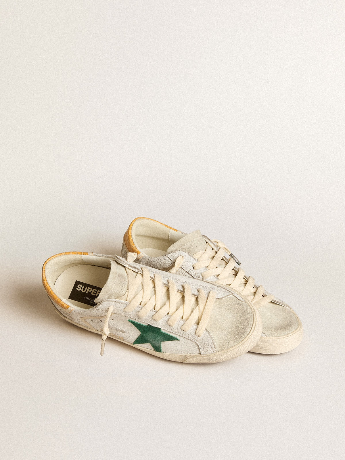 Super-Star with green suede star and yellow croc-print leather heel tab