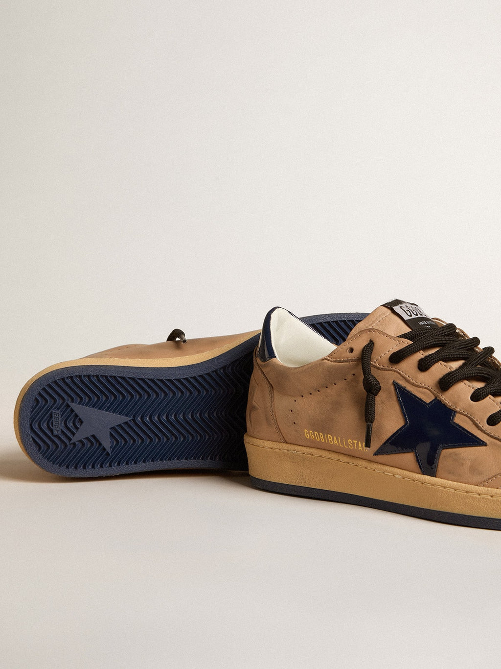 Ball Star in beige leather with blue patent leather star and heel tab