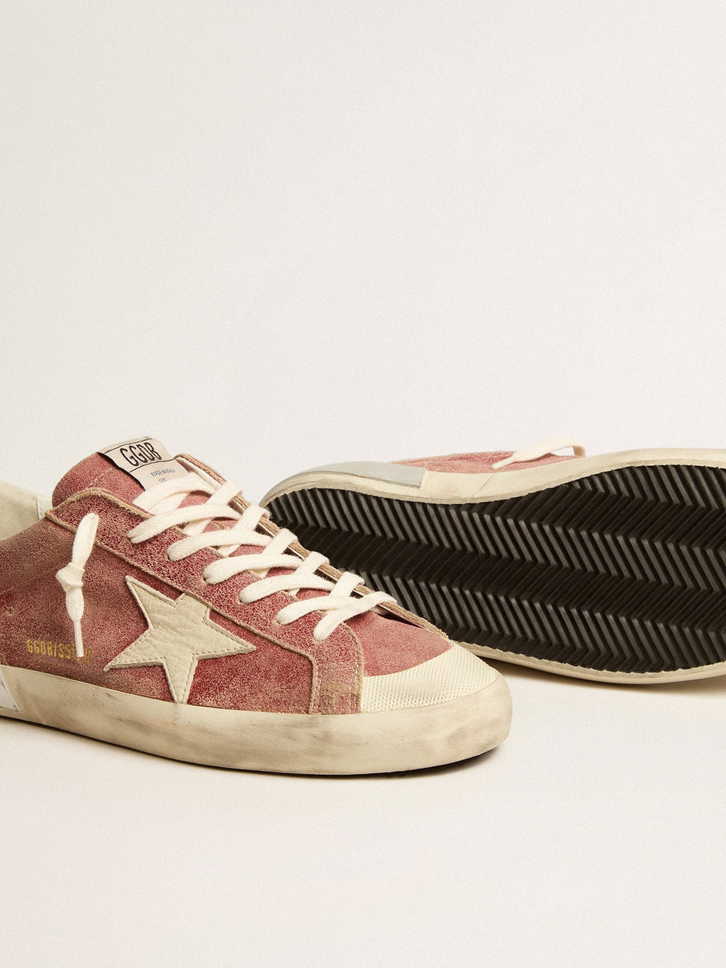 Super-Star de piel roja con estrella y lengüeta del talón de nobuk color crema
