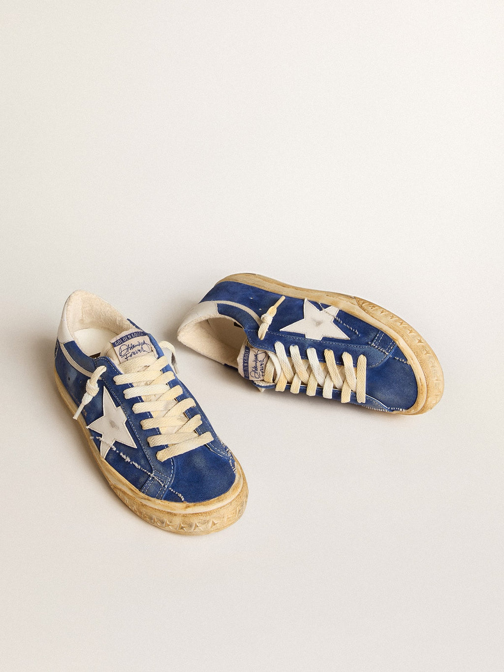 Super-Star in camoscio blu con stella e talloncino in pelle bianca