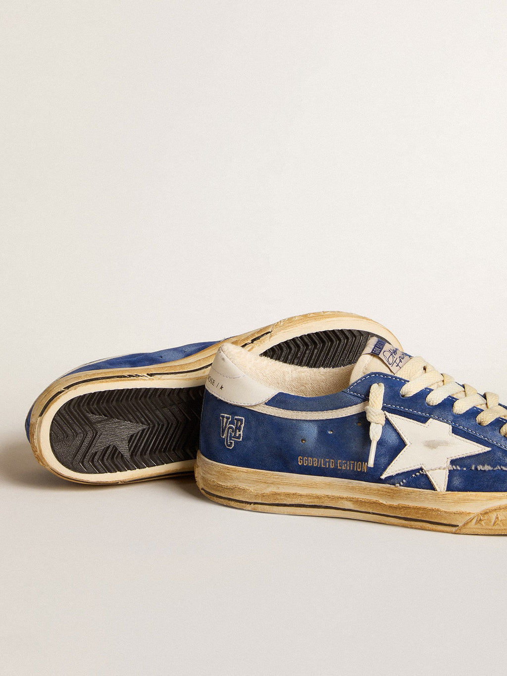 Super-Star in camoscio blu con stella e talloncino in pelle bianca