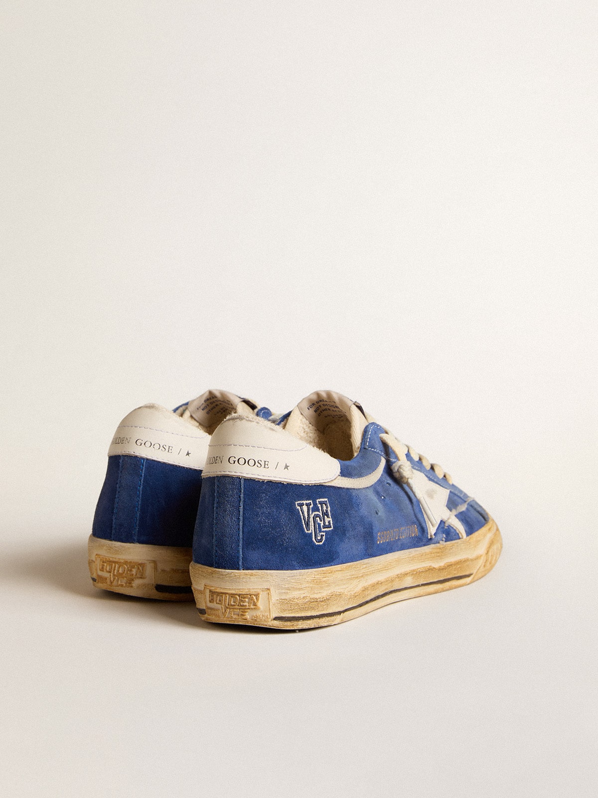Super-Star in camoscio blu con stella e talloncino in pelle bianca