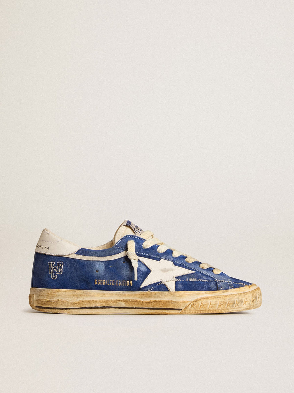 Super-Star in camoscio blu con stella e talloncino in pelle bianca