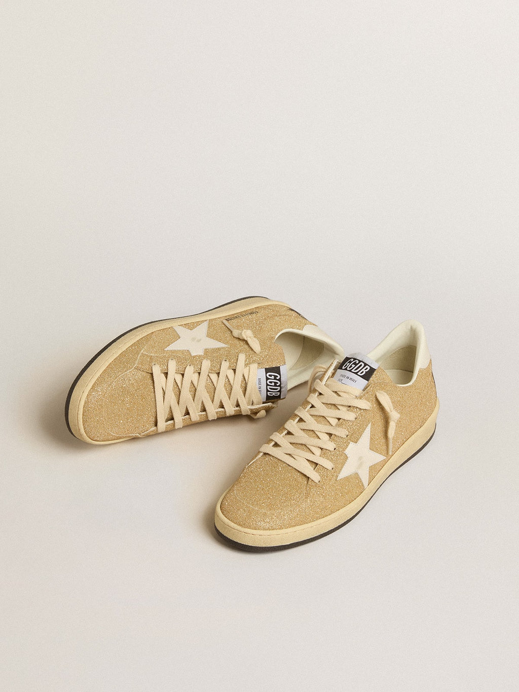 Ball Star in golden Swarovski crystals with milk-white leather star