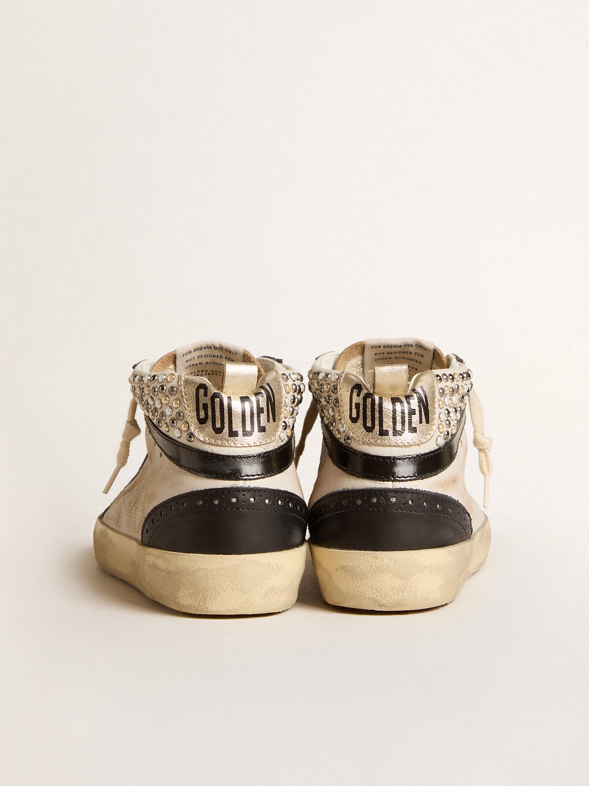 Women’s Mid Star LTD in black and white leather with pearls and perforated star